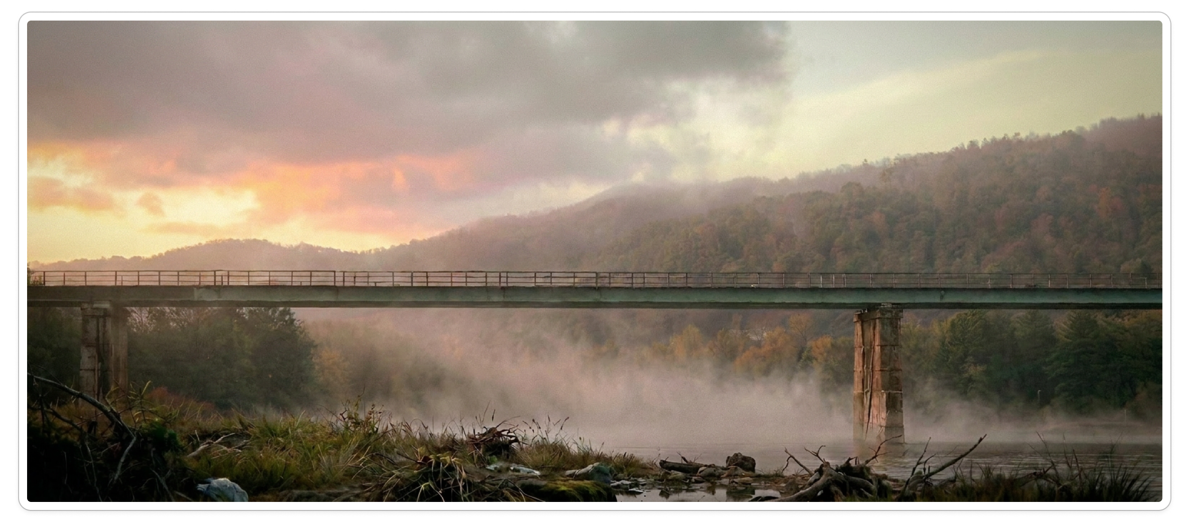 Misty river valley and train bridge environment plate at sunset